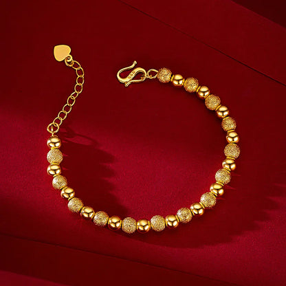 Liora Beaded Bracelet – A delicate bracelet with gold beads.