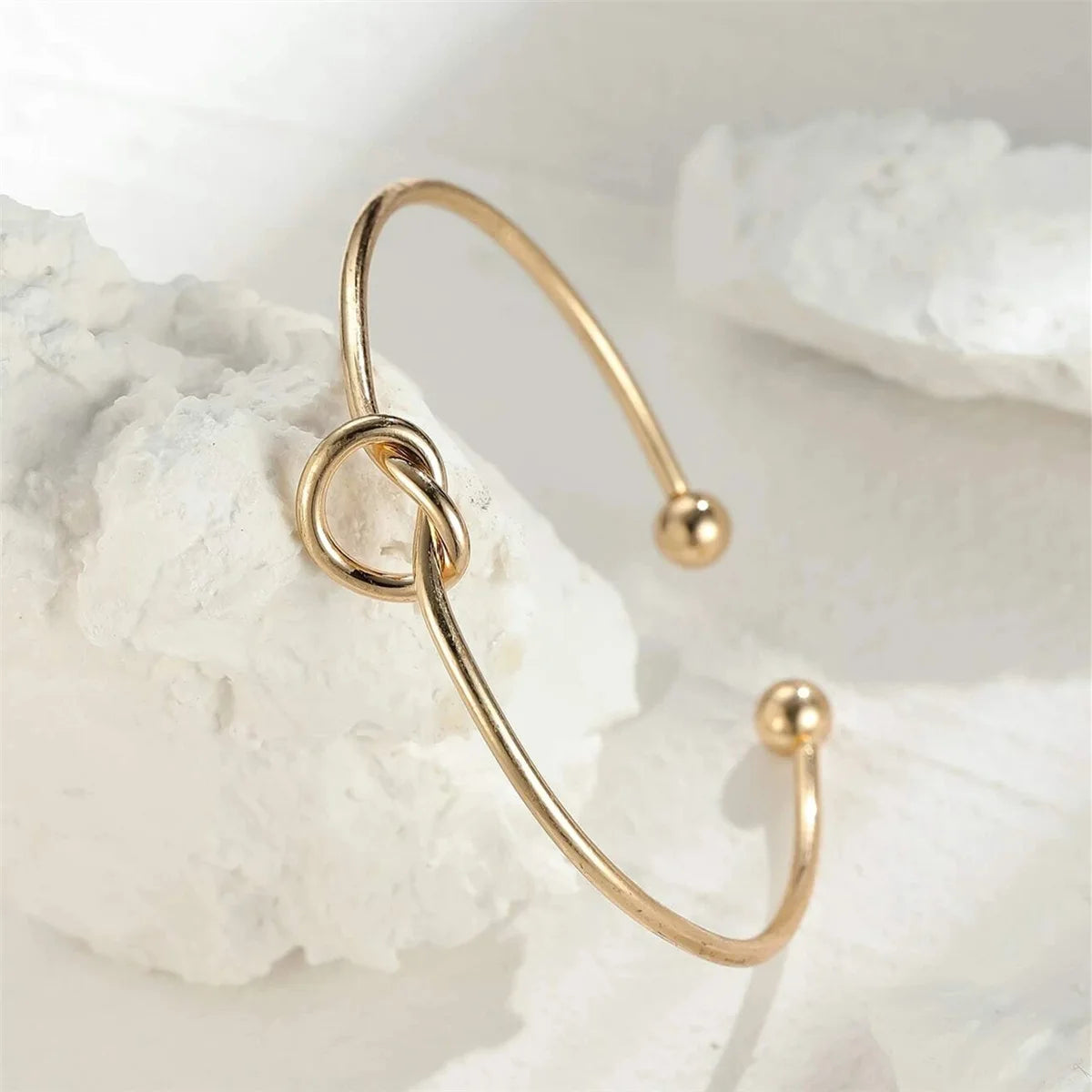 Elysian Cuff – A minimalist gold cuff with refined elegance.